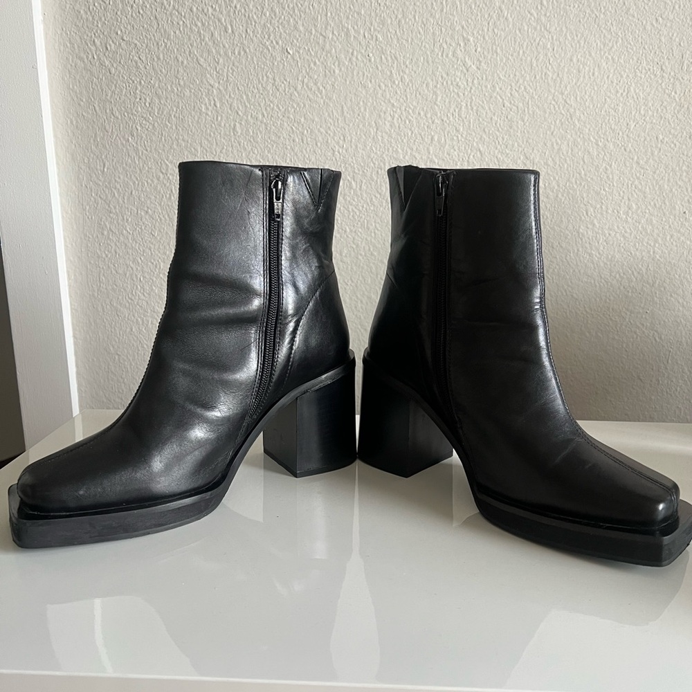 ASOS Design heeled chelsea boots with angled toe.